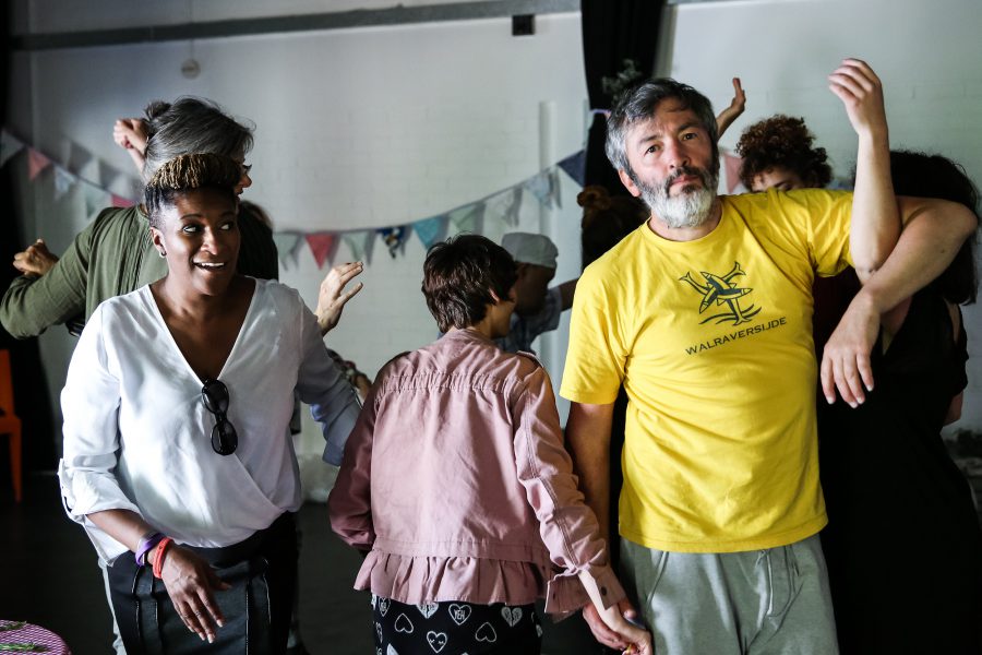 people standing and moving