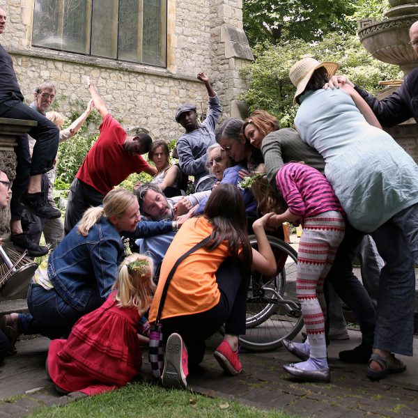 A group of people huddling together