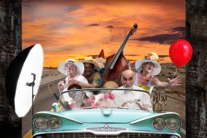 older people in a Cadillac