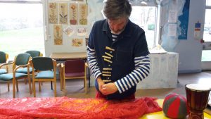 an Artist working on a wool sculpture
