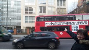 London street with taxi and bus