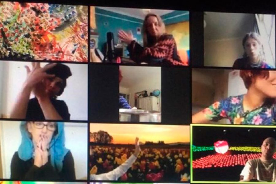 image from comnputer screen of many people in a group chat