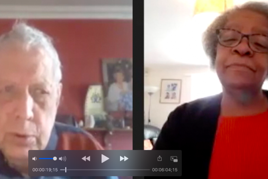 Screenshot of a white man and black woman on a Zoom call