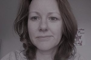 Portrait of Claire, white woman with shoulder length hair