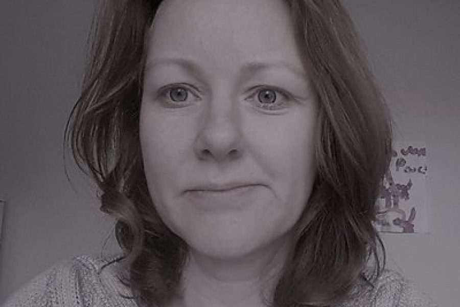 Portrait of Claire, white woman with shoulder length hair