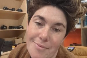 A white person with short brown hair