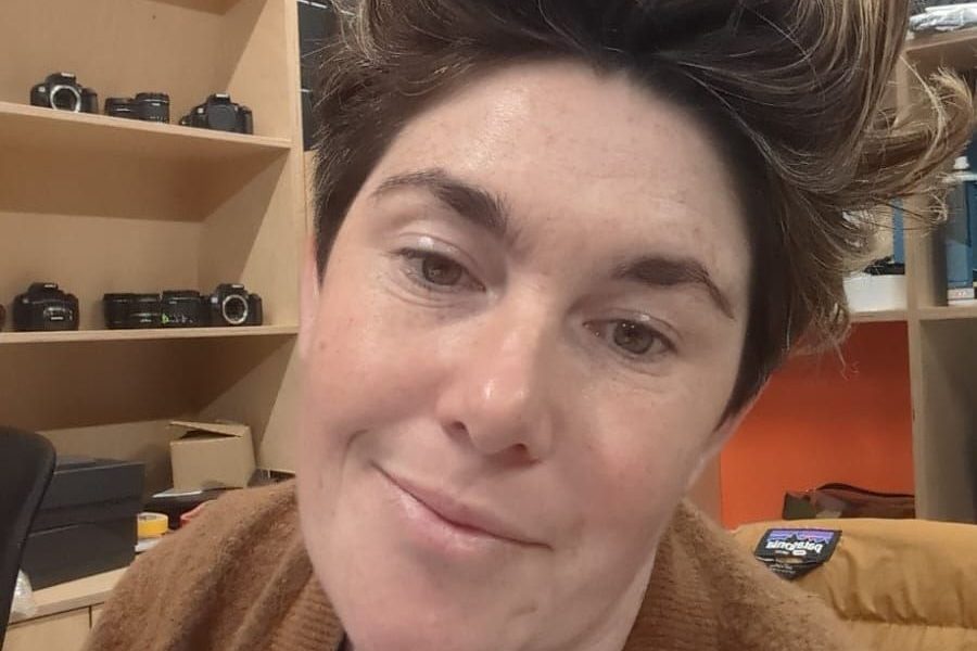 A white person with short brown hair